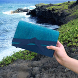 Pochette Eden Bow en bleu océan