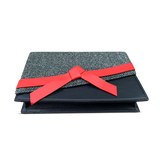 Pochette à nœud Eden en noir/blanc