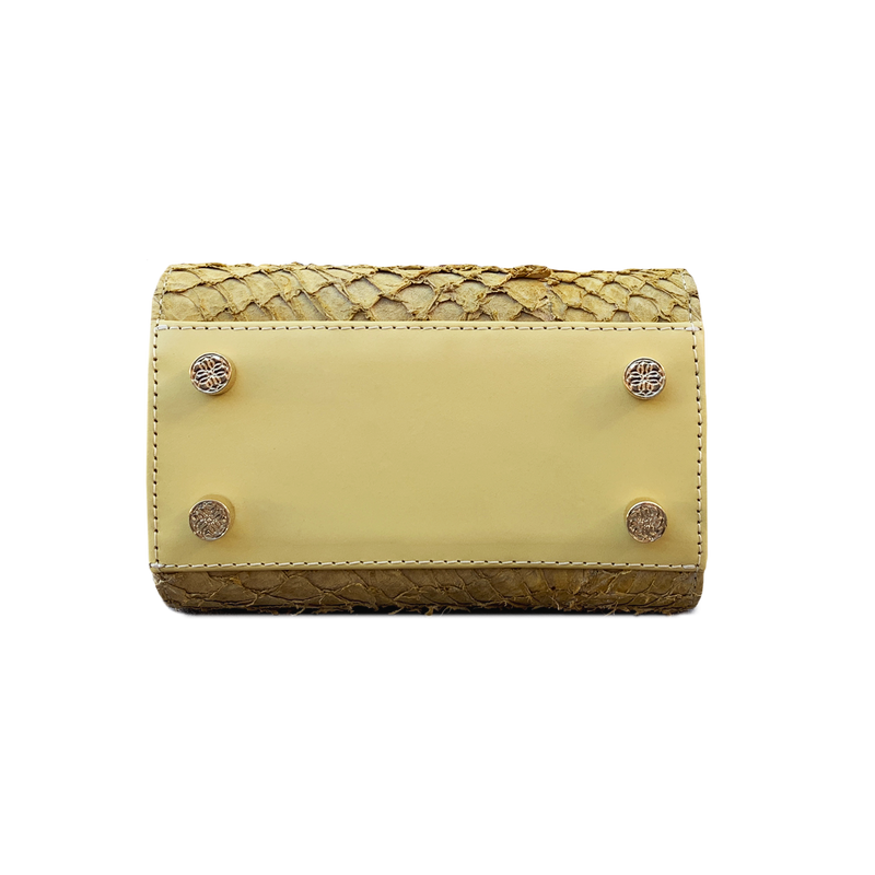 Lola Prusac Sabel mini satchel in butter bottom view with gold feet
